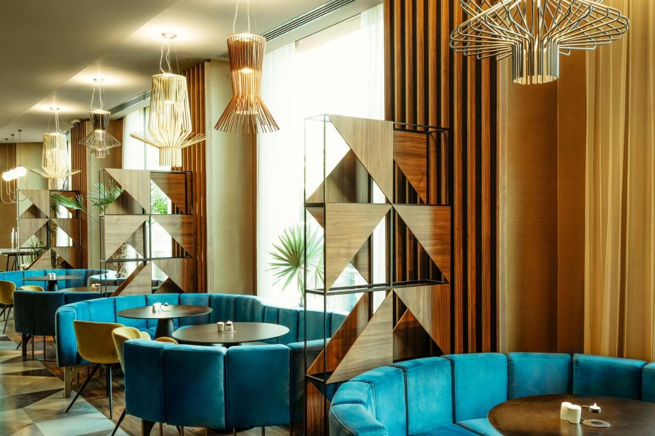 Radisson Blu Aurum Hotel, Braşov Buitenkant foto The interior of the restaurant